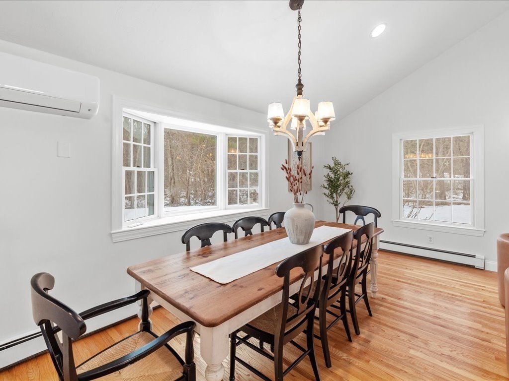 1 Scott Street Medfield, MA 02052 - Photo 16 of 42 a dining room with furniture a chandelier and wooden floor