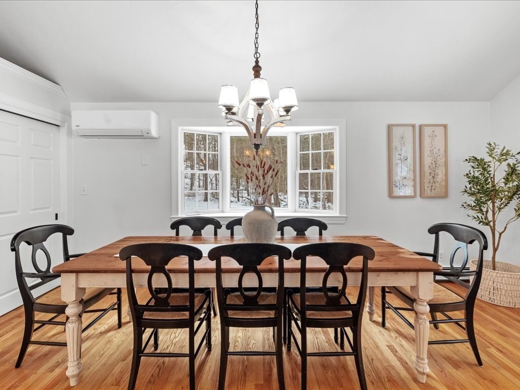 1 Scott Street Medfield, MA 02052 - Photo 19 of 42 a view of a dining room that has a table and chairs