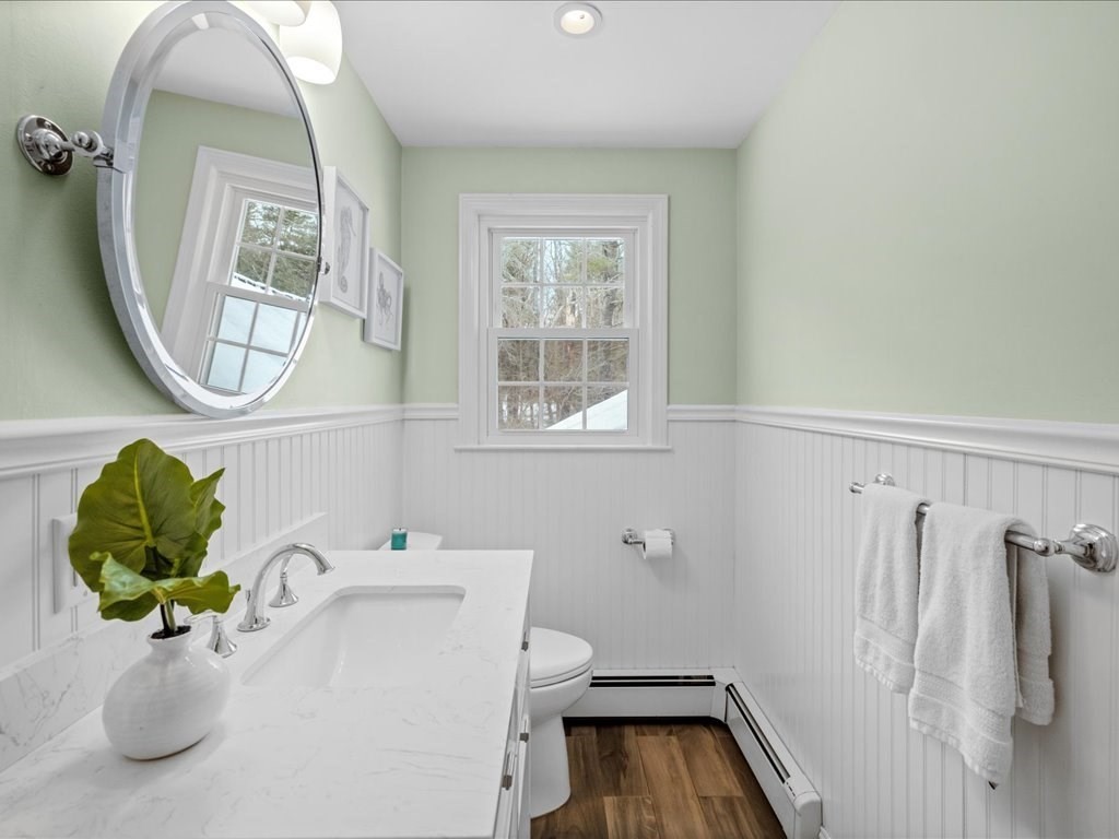 1 Scott Street Medfield, MA 02052 - Photo 30 of 42 a bathroom with a sink toilet and a mirror