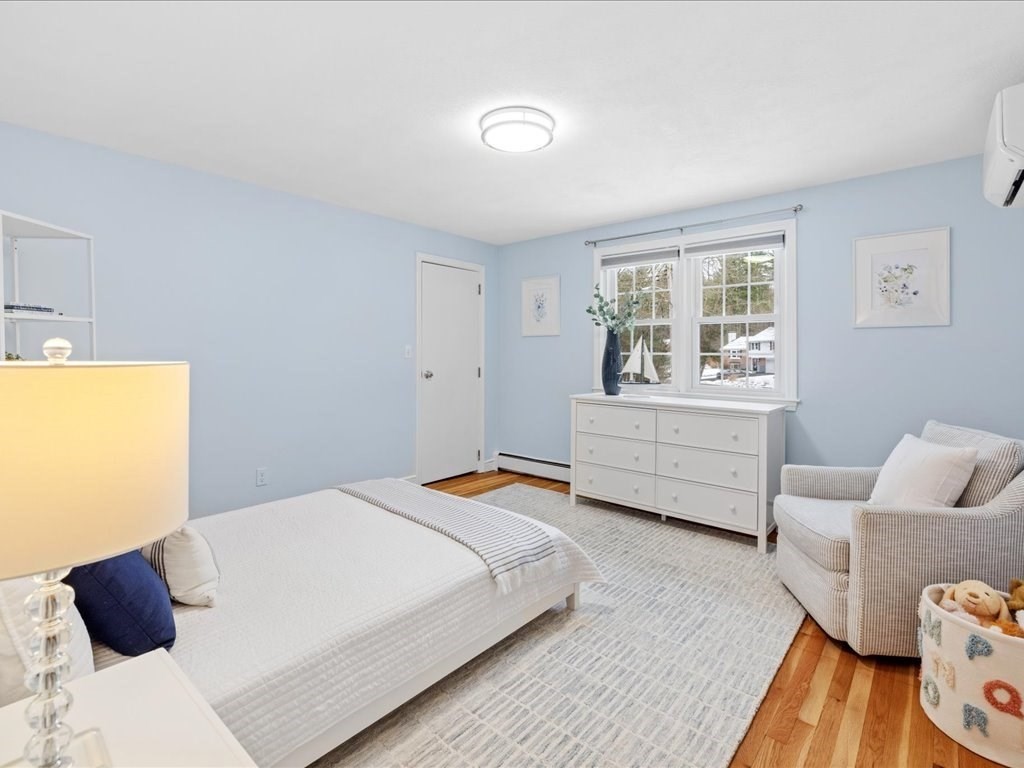 1 Scott Street Medfield, MA 02052 - Photo 31 of 42 a bedroom with a bed and a couch