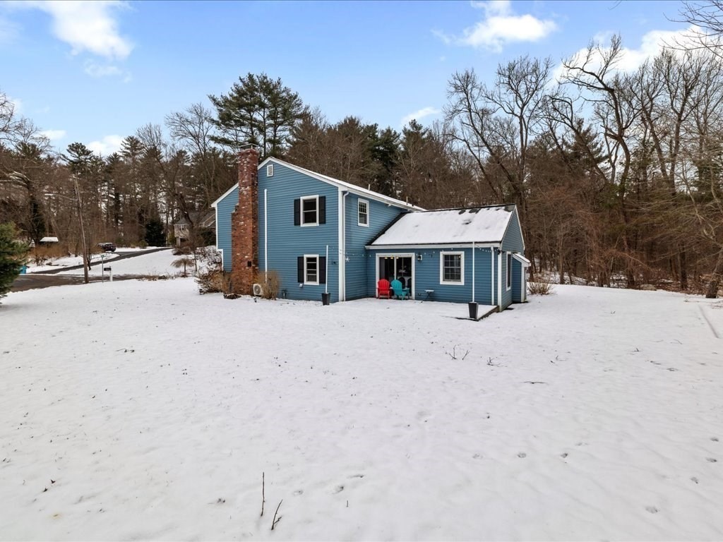 1 Scott Street Medfield, MA 02052 - Photo 40 of 42 a front view of a house with a yard covered in snow