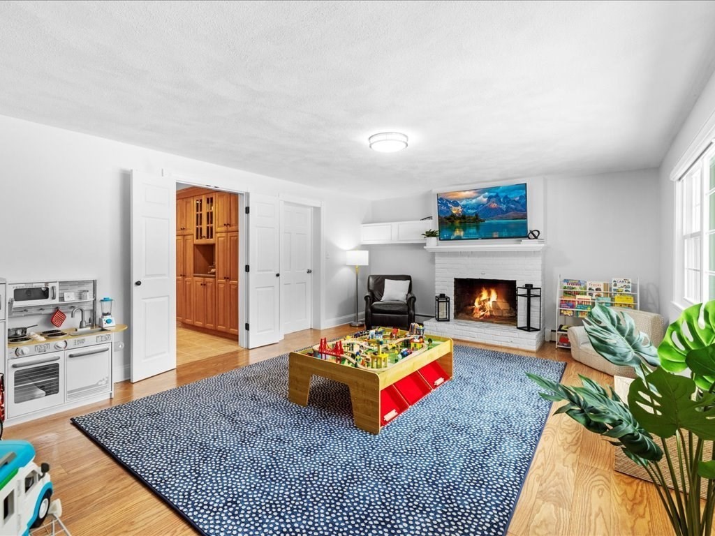 1 Scott Street Medfield, MA 02052 - Photo 4 of 42 a living room with furniture and a fireplace