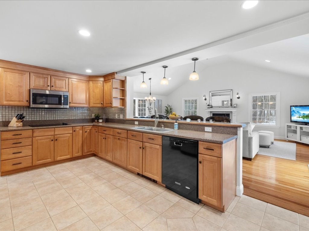 1 Scott Street Medfield, MA 02052 - Photo 6 of 42 a kitchen with stainless steel appliances granite countertop a stove sink and cabinets