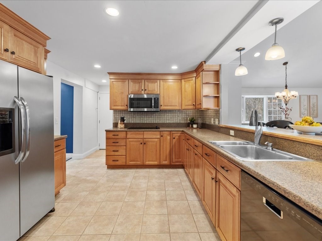 1 Scott Street Medfield, MA 02052 - Photo 7 of 42 a large kitchen with kitchen island a large counter top stainless steel appliances and cabinets