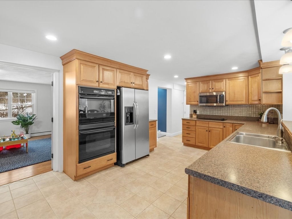 1 Scott Street Medfield, MA 02052 - Photo 8 of 42 a kitchen with stainless steel appliances granite countertop a refrigerator and a sink