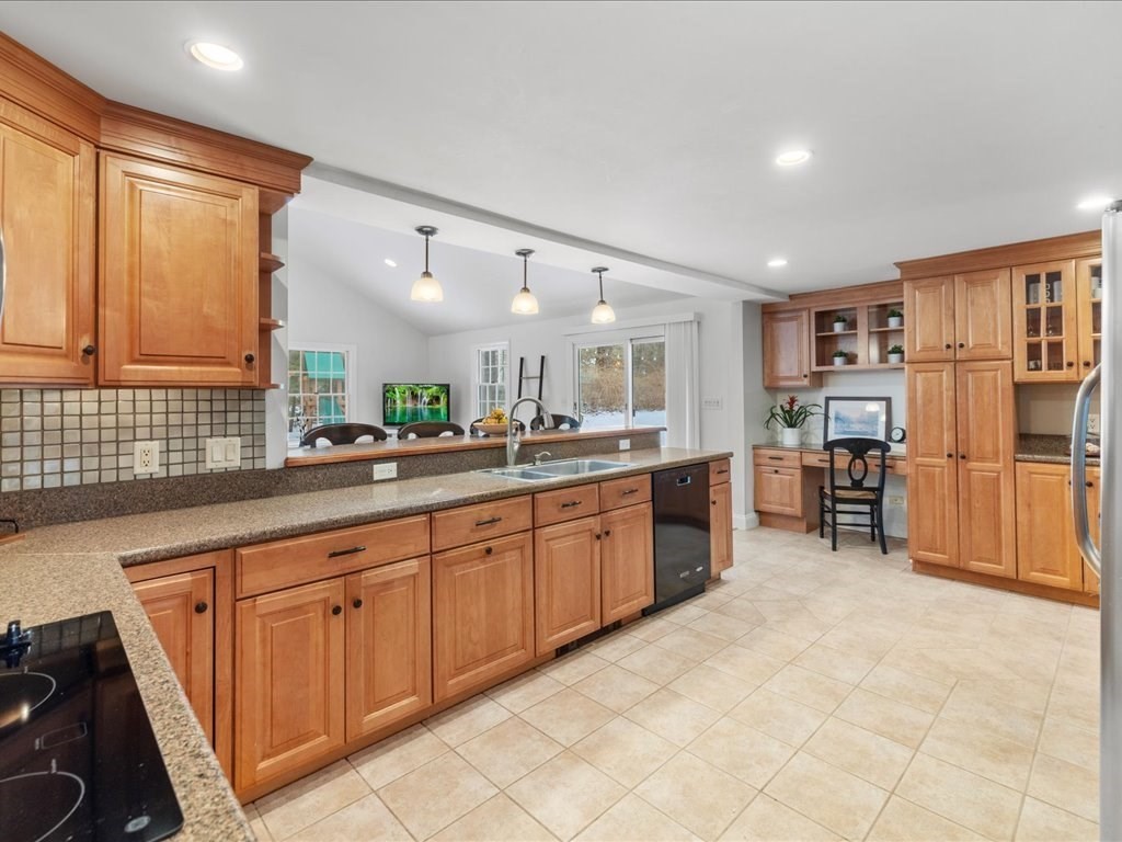 1 Scott Street Medfield, MA 02052 - Photo 9 of 42 a large kitchen with kitchen island a large counter top space a sink stainless steel appliances and cabinets