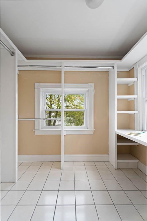 49-53 Appleton Street, Unit 7 Arlington, MA 02476 - Photo 15 of 21 a view of an empty room with a window