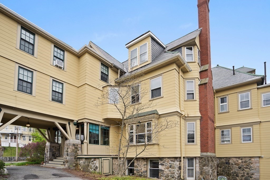 49-53 Appleton Street, Unit 7 Arlington, MA 02476 - Photo 17 of 21 a view of a large white building