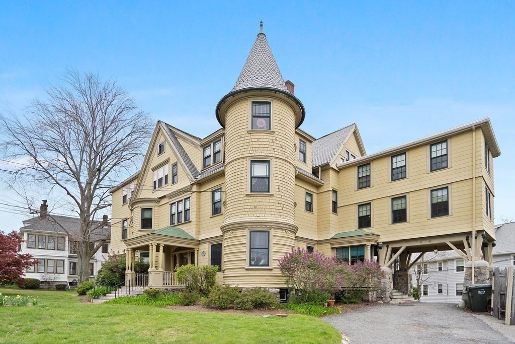 49-53 Appleton Street, Unit 7 Arlington, MA 02476 - Photo 18 of 21 front view of residential houses with yard