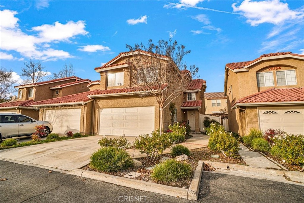 front view of a house with a street