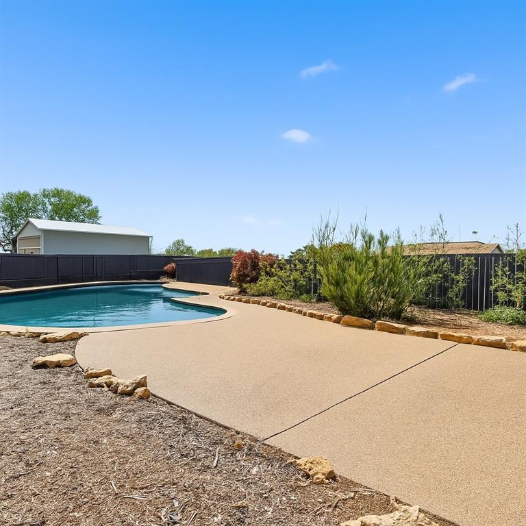 3873 Lois Road East Sanger, TX 76266 - Photo 33 of 40 Exterior swimming pool with fence surround and private!