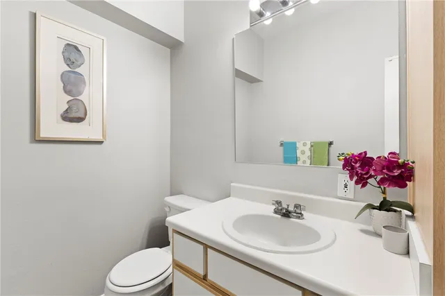 a bed room with a bed and a chandelier