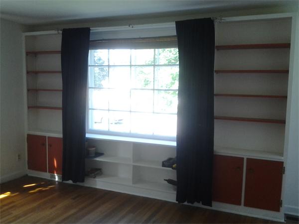 161 Mayflower Road Springfield, MA 01118 - Photo 11 of 20 a view of an empty room with a window and wooden floor