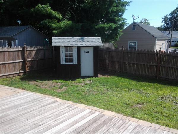 161 Mayflower Road Springfield, MA 01118 - Photo 20 of 20 a front view of a house with a yard
