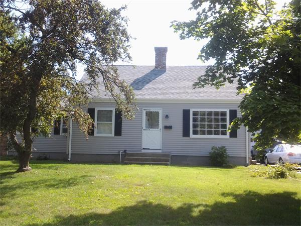 161 Mayflower Road Springfield, MA 01118 - Photo 2 of 20 a front view of a house with a yard