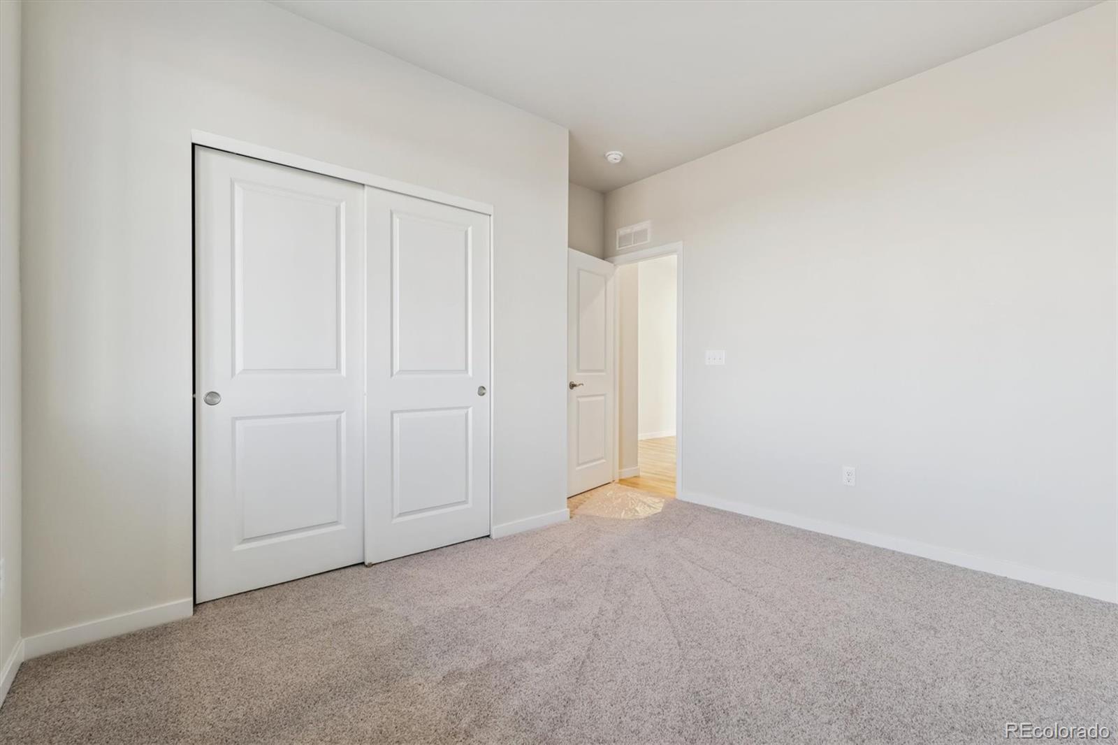 1430 Farmstead Street Brighton, CO 80601 - Photo 11 of 24 a view of an empty room
