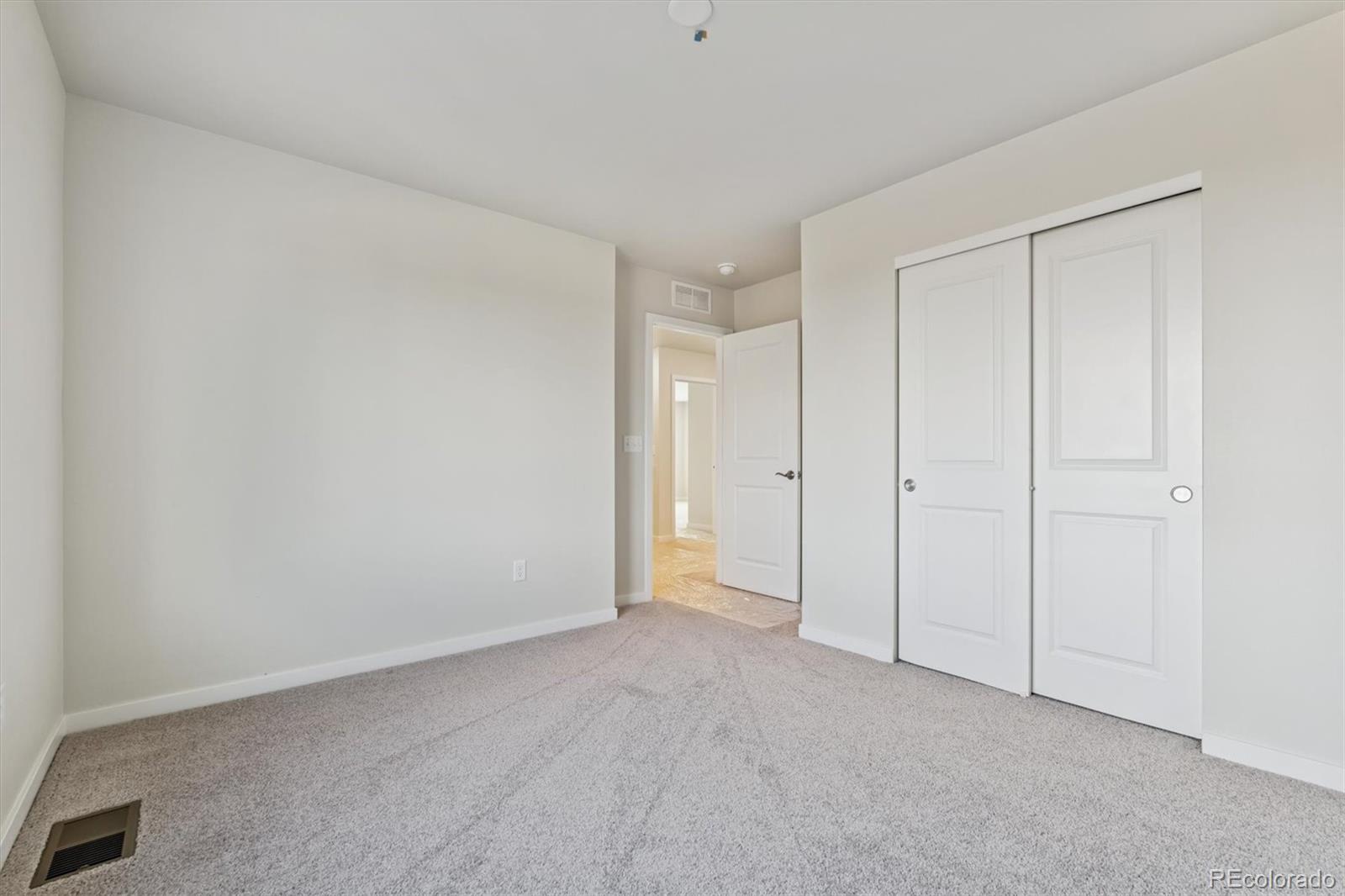 1430 Farmstead Street Brighton, CO 80601 - Photo 19 of 24 a view of an empty room