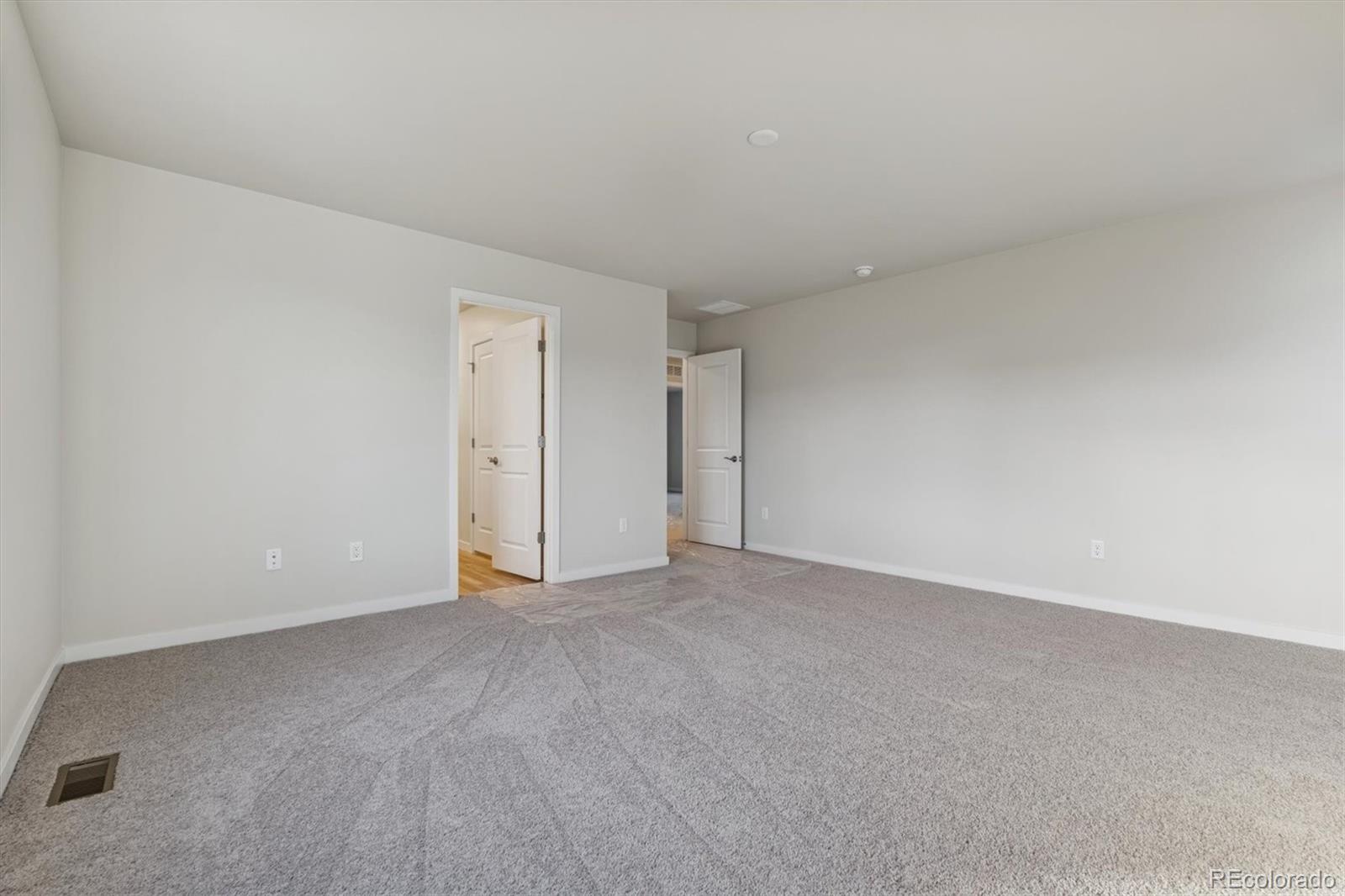 1430 Farmstead Street Brighton, CO 80601 - Photo 22 of 24 a view of an empty room