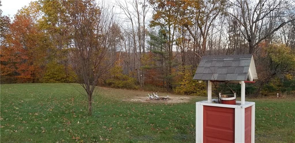 430 Back Road Shapleigh, ME 04076 - Photo 5 of 34 Right side yard with firepit and...