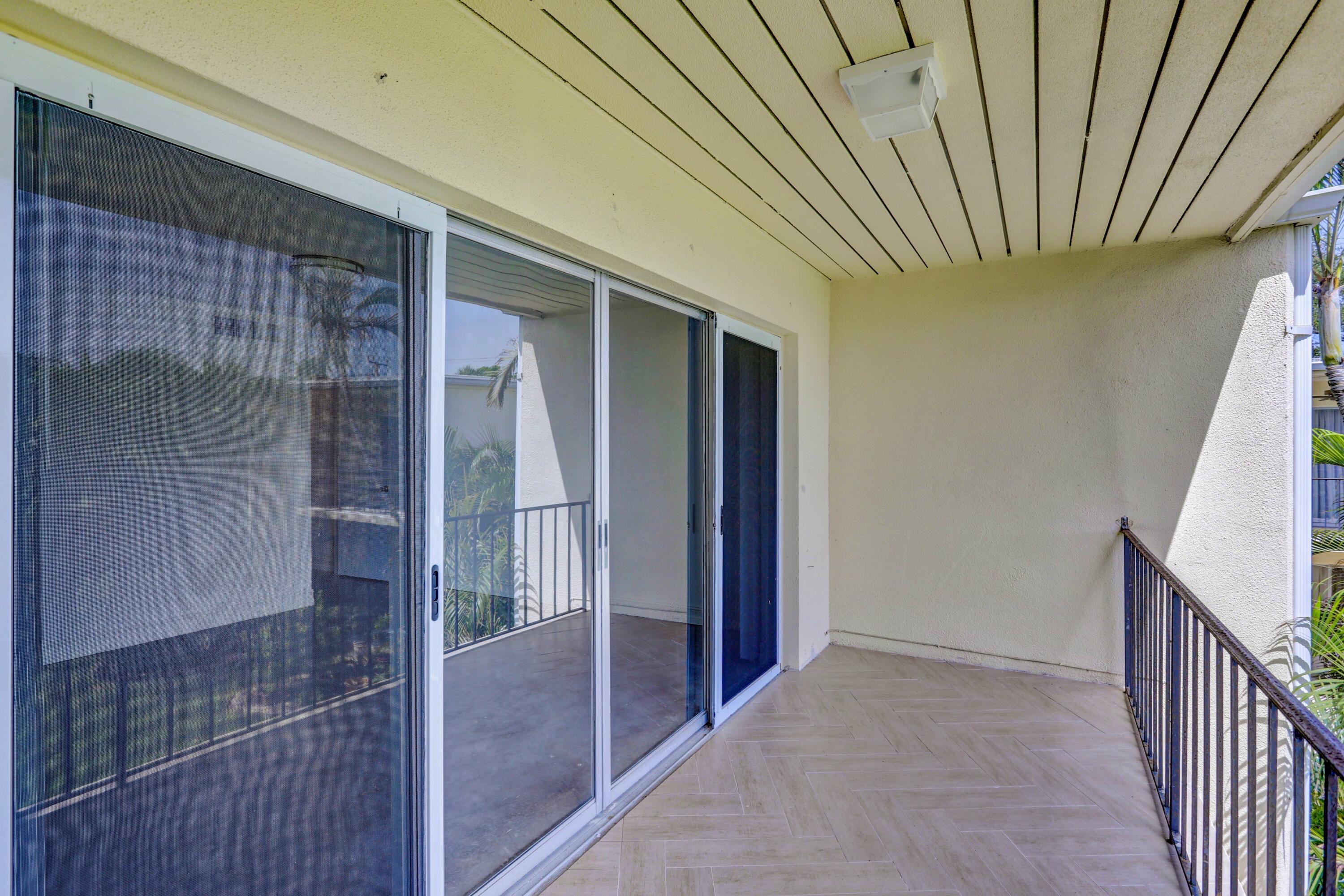 394 Golfview Road, Unit F North Palm Beach, FL 33408 - Photo 36 of 73 Master Bedroom Balcony