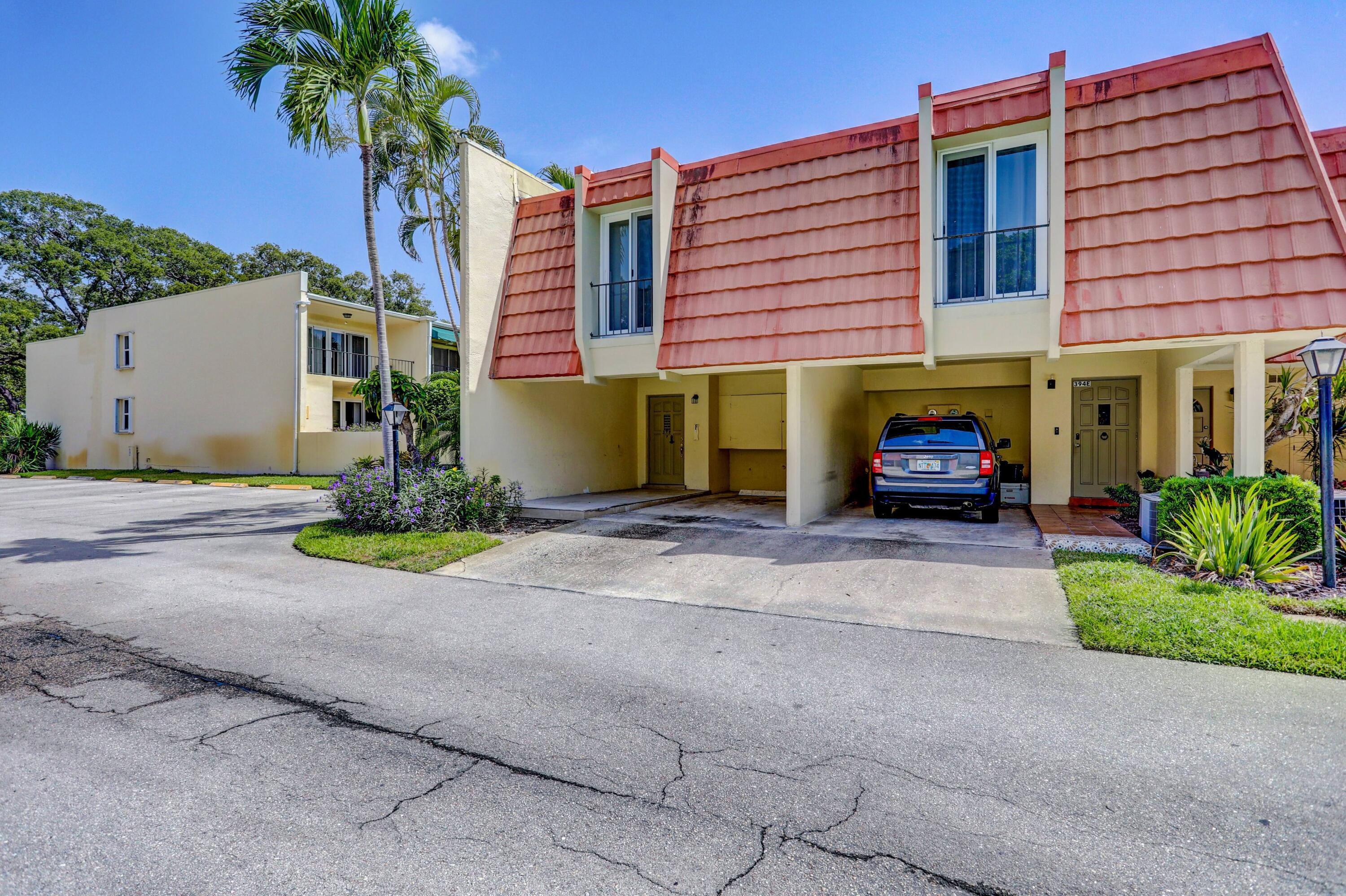 394 Golfview Road, Unit F North Palm Beach, FL 33408 - Photo 4 of 73 a car parked in front of a building