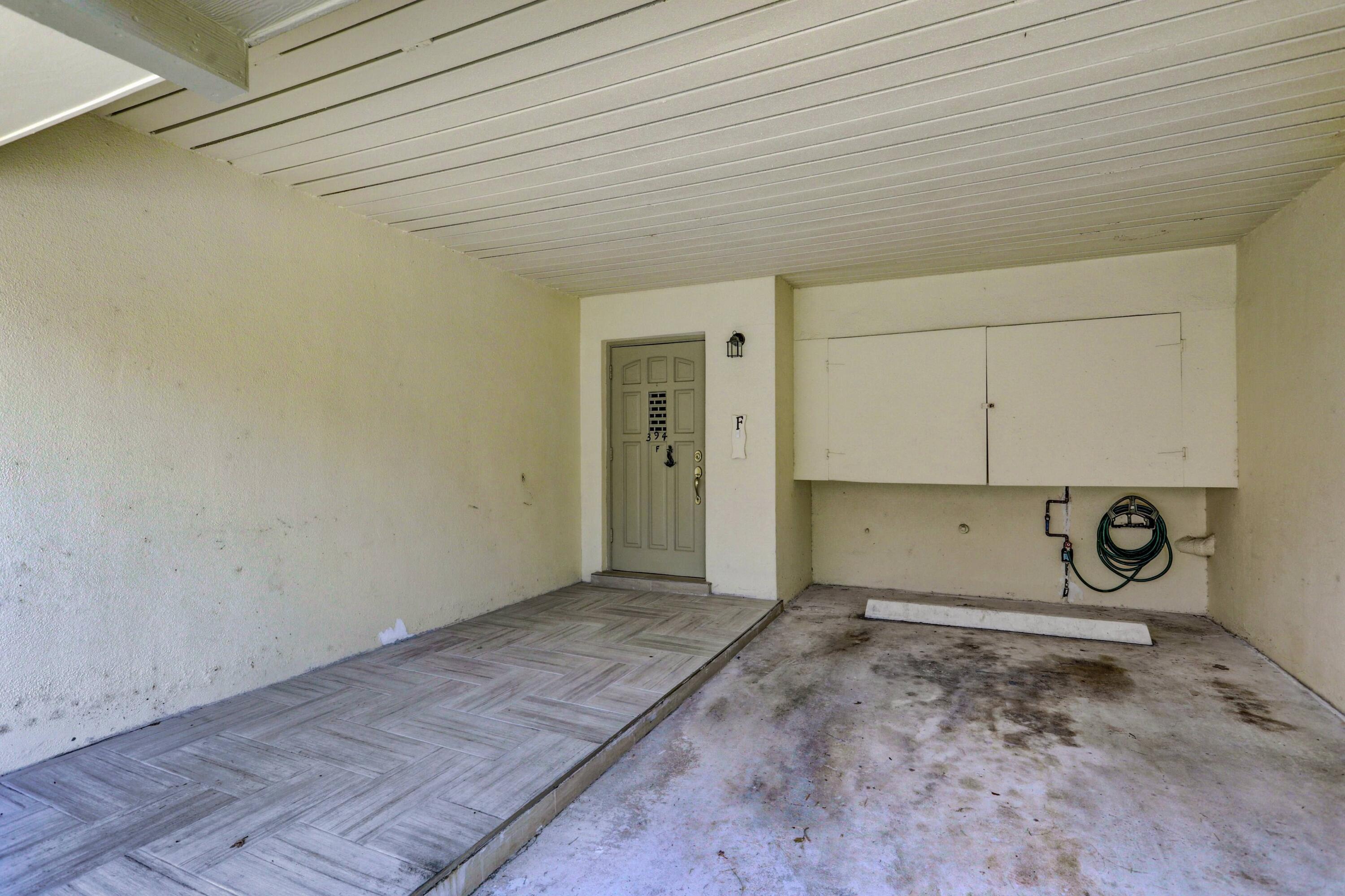 394 Golfview Road, Unit F North Palm Beach, FL 33408 - Photo 6 of 73 a view of a garage