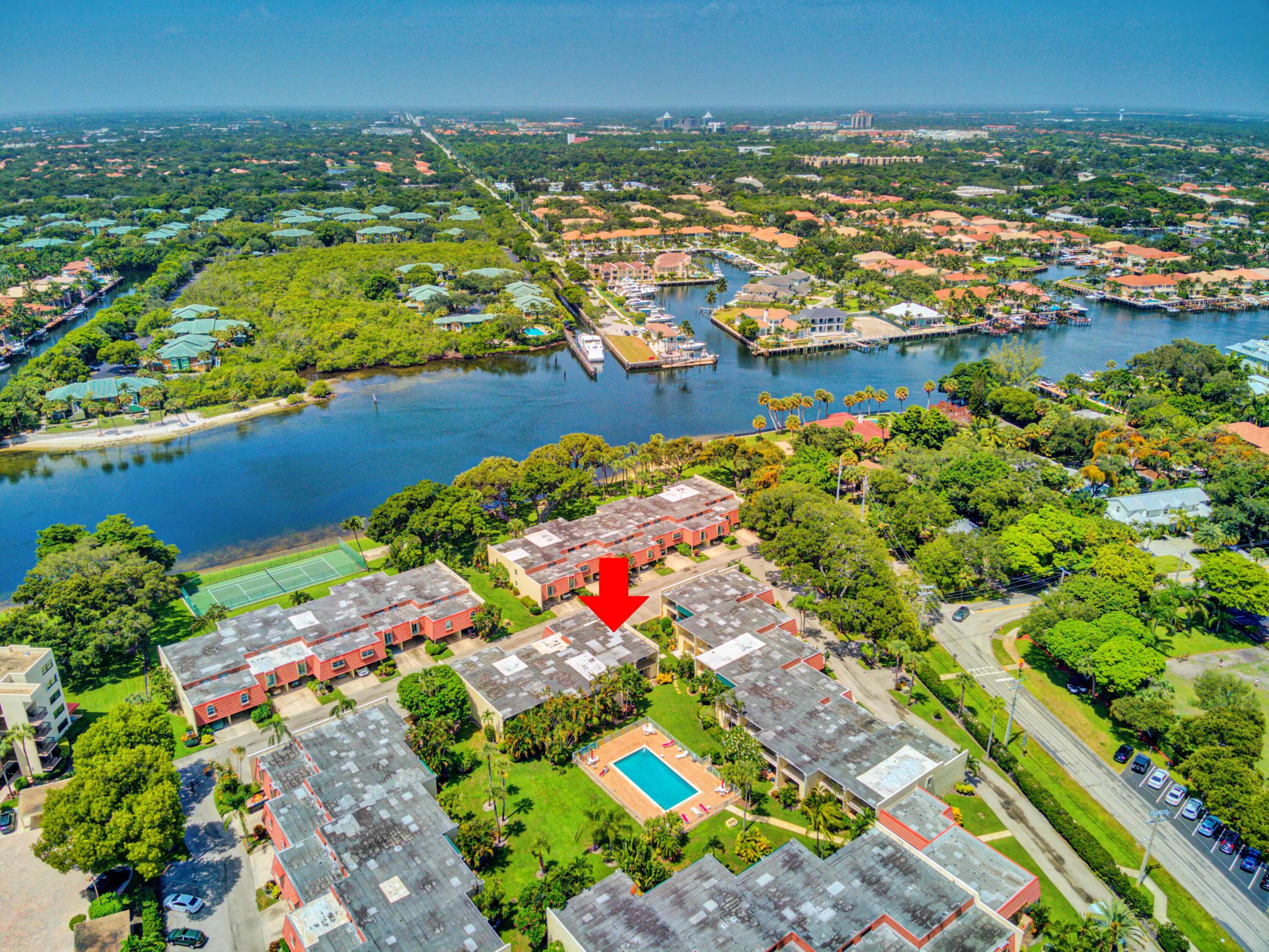 394 Golfview Road, Unit F North Palm Beach, FL 33408 - Photo 64 of 73 an aerial view of residential houses with outdoor space