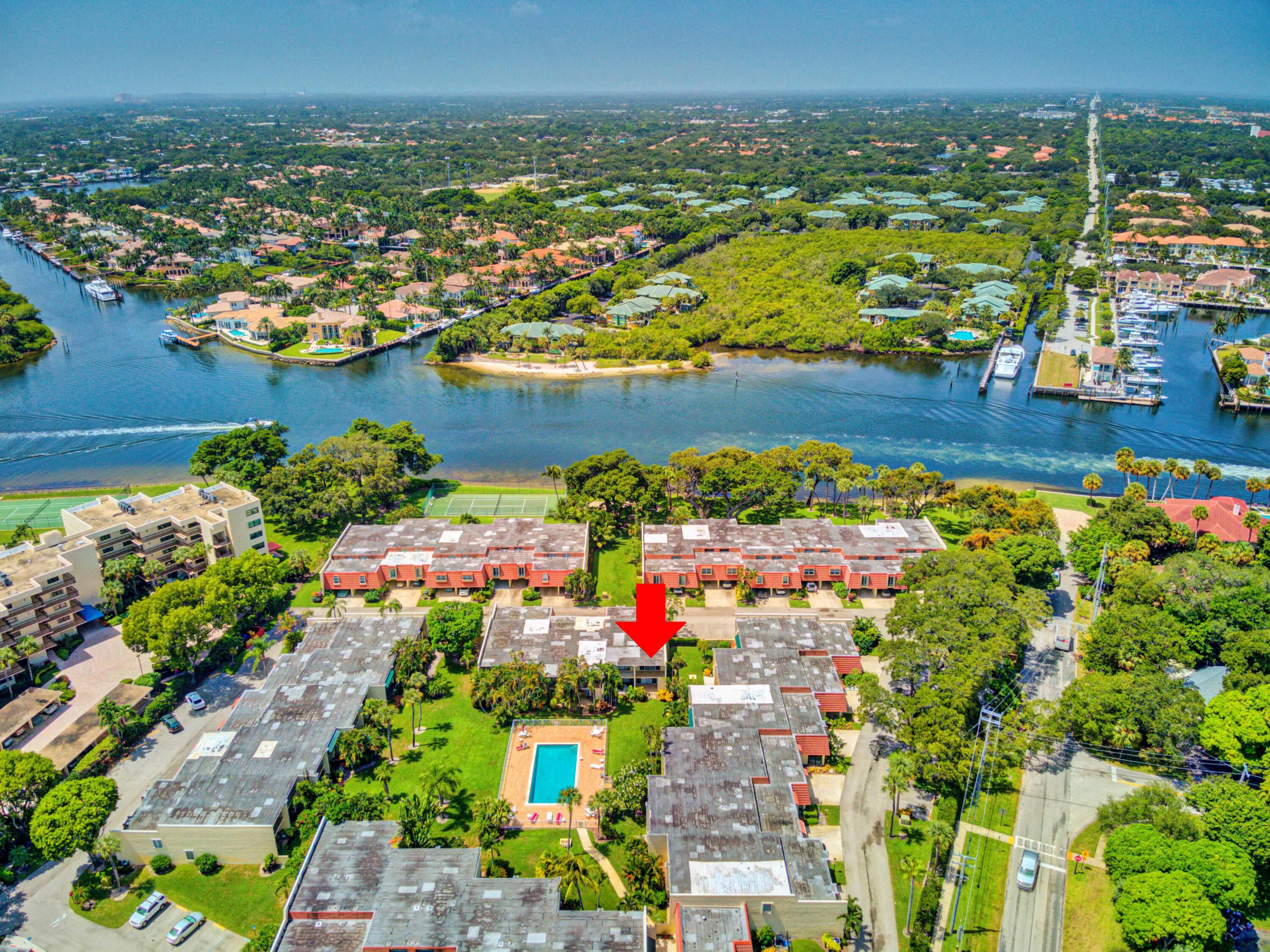 394 Golfview Road, Unit F North Palm Beach, FL 33408 - Photo 66 of 73 an aerial view of residential houses with outdoor space