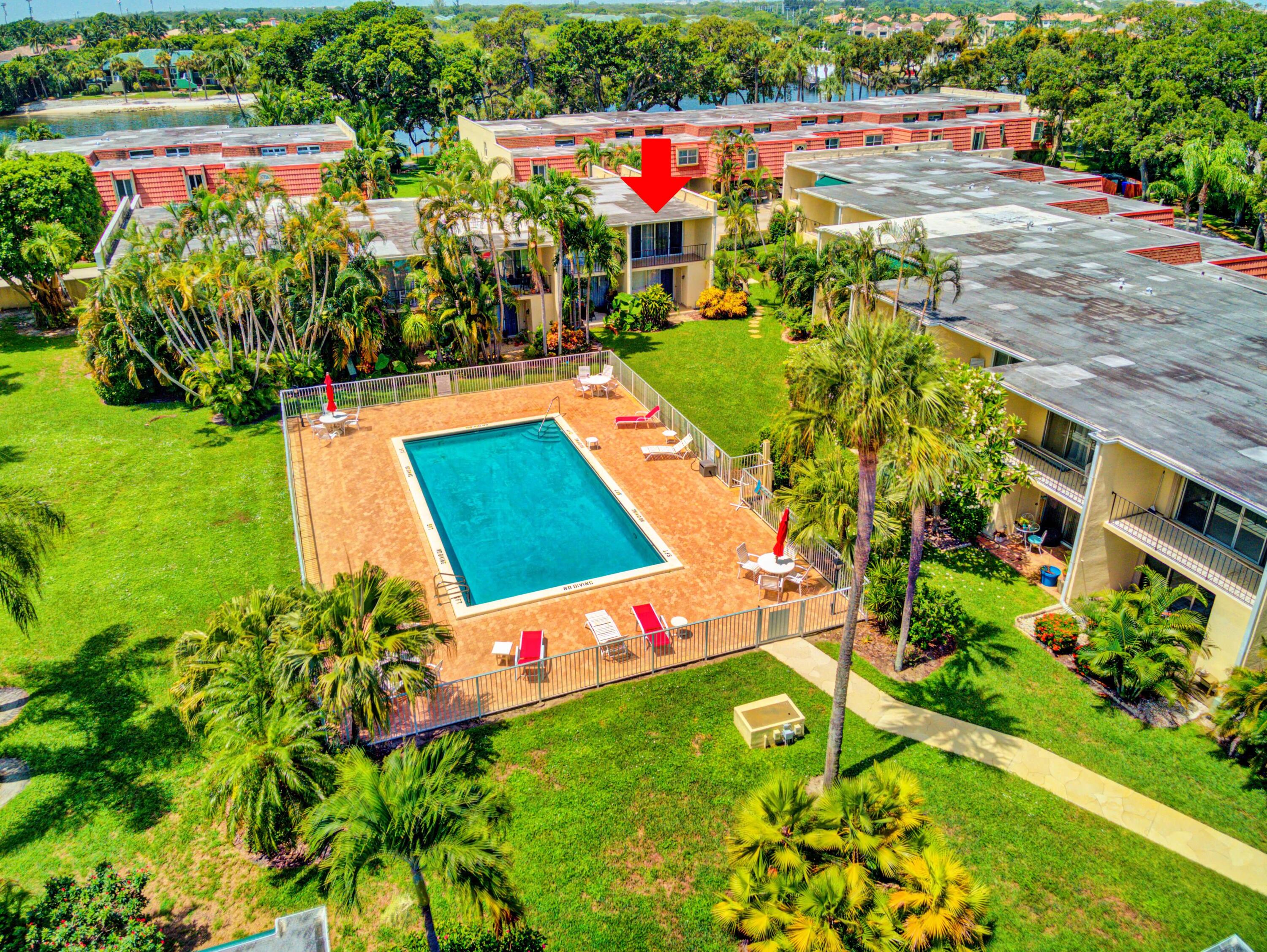 394 Golfview Road, Unit F North Palm Beach, FL 33408 - Photo 69 of 73 Aerial View of the community pool