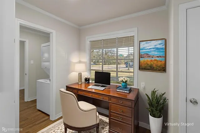 a view of an empty room with a window