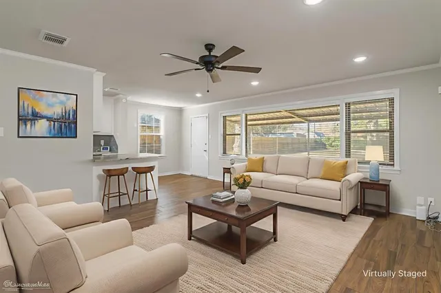 a kitchen with a stove a sink and a refrigerator