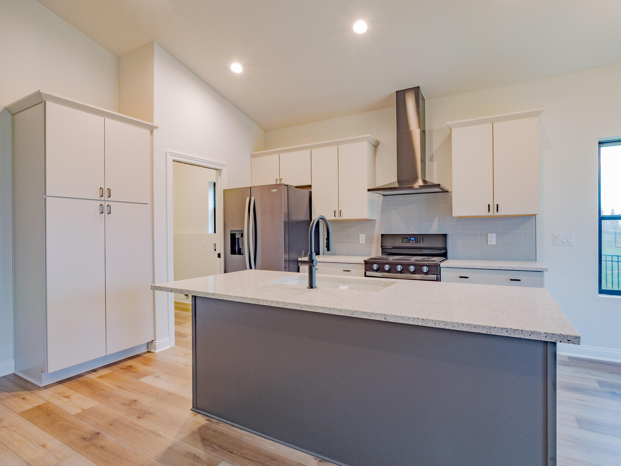 3004 Forestside Lane Valparaiso, IN 46385 - Photo 12 of 23 a kitchen with stainless steel appliances a sink stove and refrigerator
