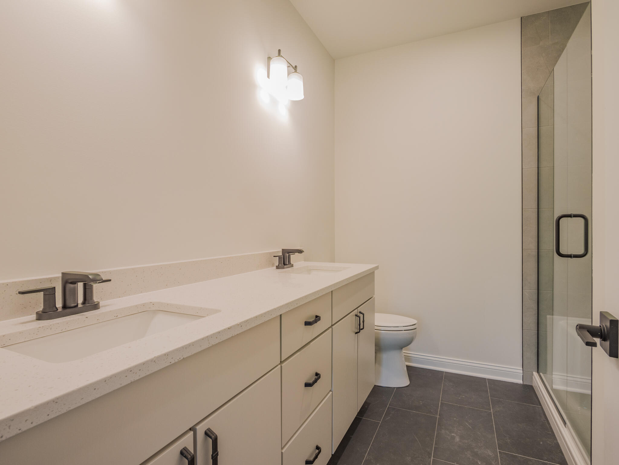 3004 Forestside Lane Valparaiso, IN 46385 - Photo 20 of 23 a bathroom with a sink a toilet and shower