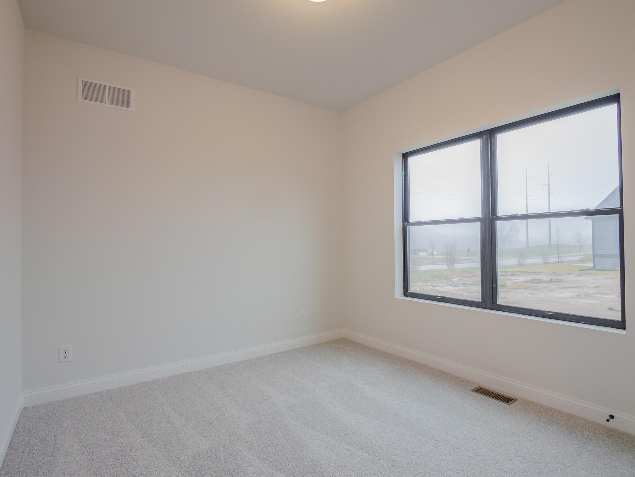 3004 Forestside Lane Valparaiso, IN 46385 - Photo 6 of 23 an empty room with a window