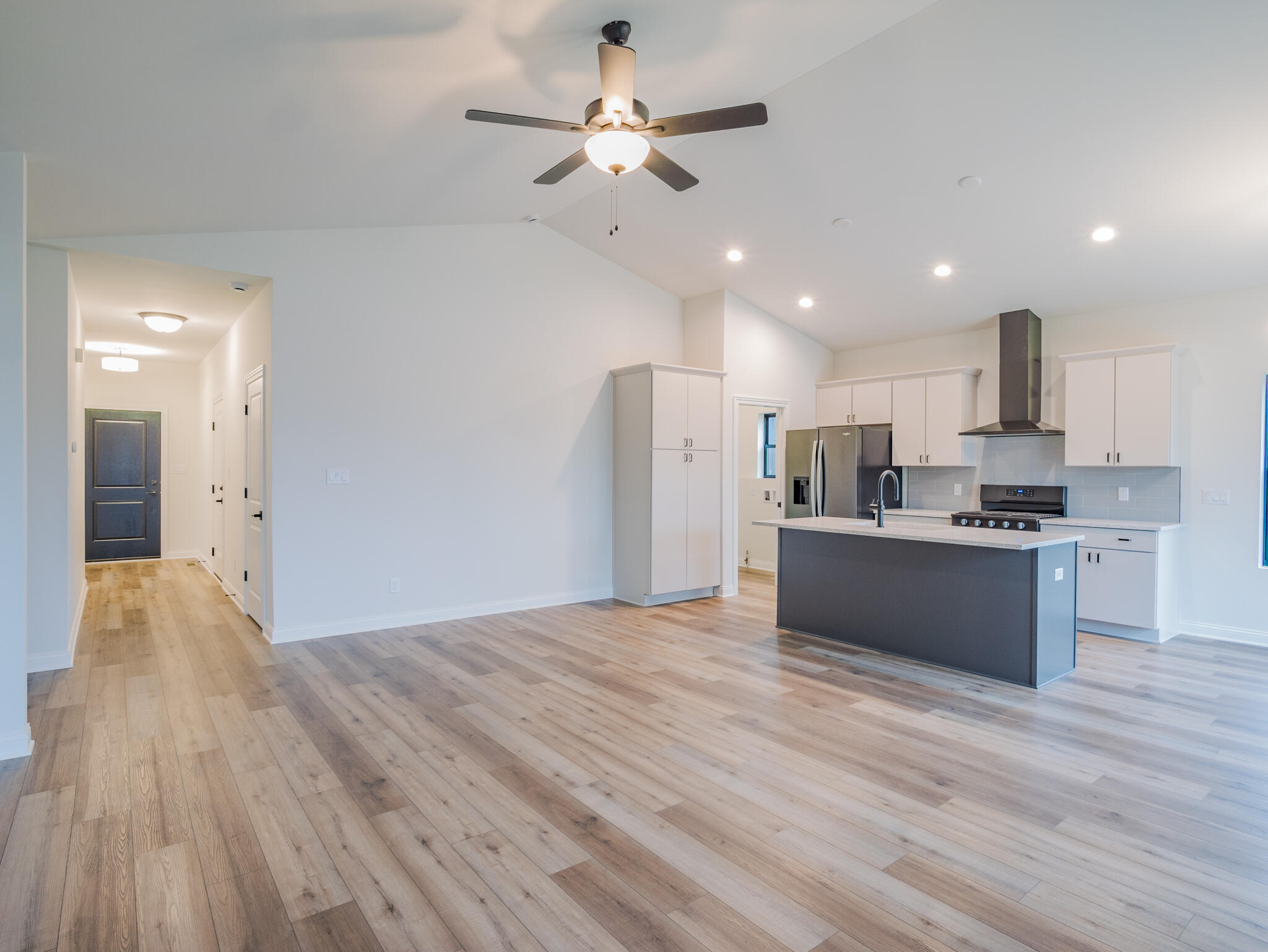3004 Forestside Lane Valparaiso, IN 46385 - Photo 10 of 23 a large kitchen with kitchen island a sink stainless steel appliances and cabinets