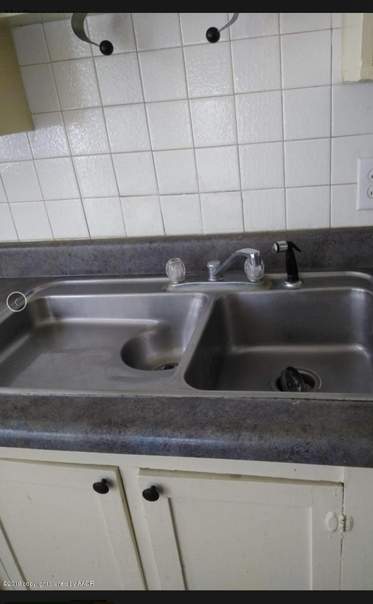 3531-3529 South Harrison Street Amarillo, TX 79110 - Photo 17 of 30 a close view of sink and tap