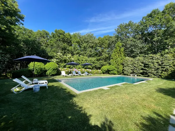 a garden view with a sitting space