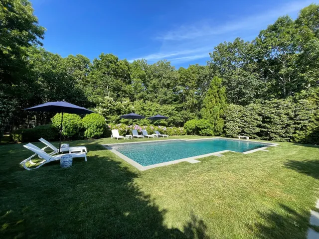 a garden view with a sitting space