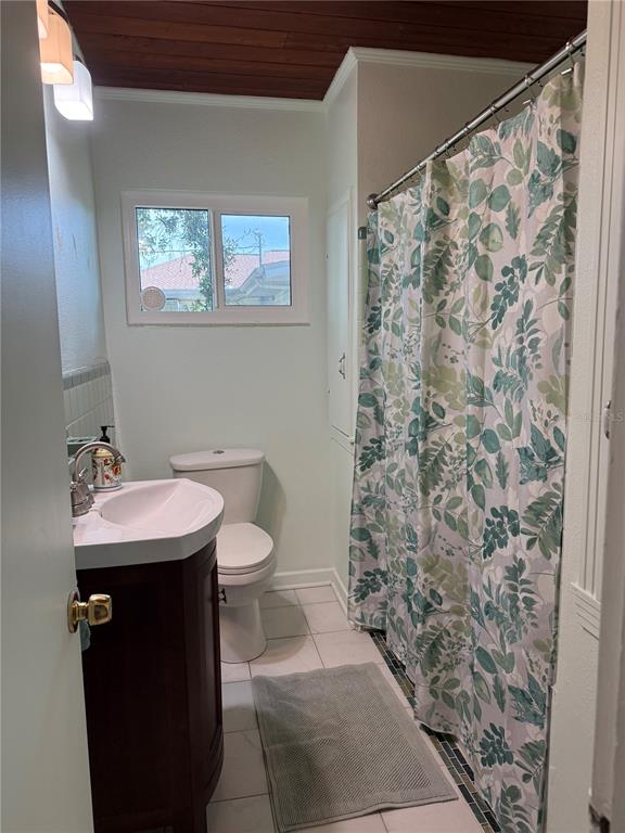 421 Riviera Street Venice, FL 34285 - Photo 17 of 31 a bathroom with a sink toilet and shower