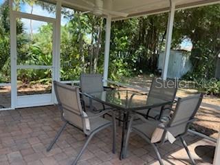 421 Riviera Street Venice, FL 34285 - Photo 23 of 31 a view of an outdoor sitting area with furniture and backyard