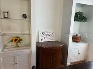 a bathroom with a sink and mirror
