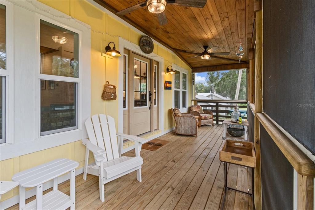 5328 Riverside Drive Yankeetown, FL 34498 - Photo 2 of 46 a living room with furniture and a large window