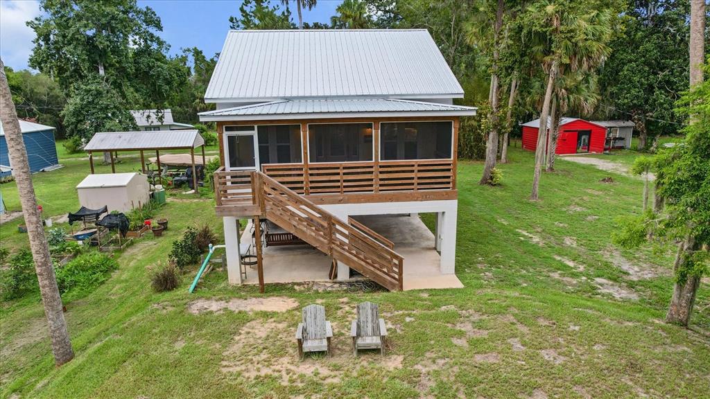 5328 Riverside Drive Yankeetown, FL 34498 - Photo 30 of 46 a view of a house with a yard