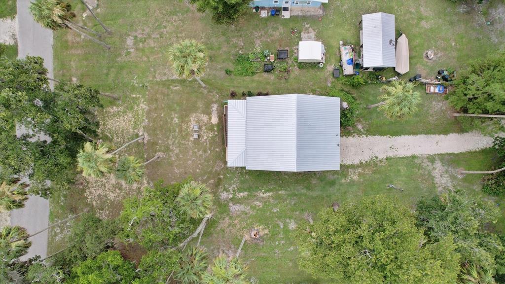 5328 Riverside Drive Yankeetown, FL 34498 - Photo 32 of 46 an aerial view of a house with a yard and trees
