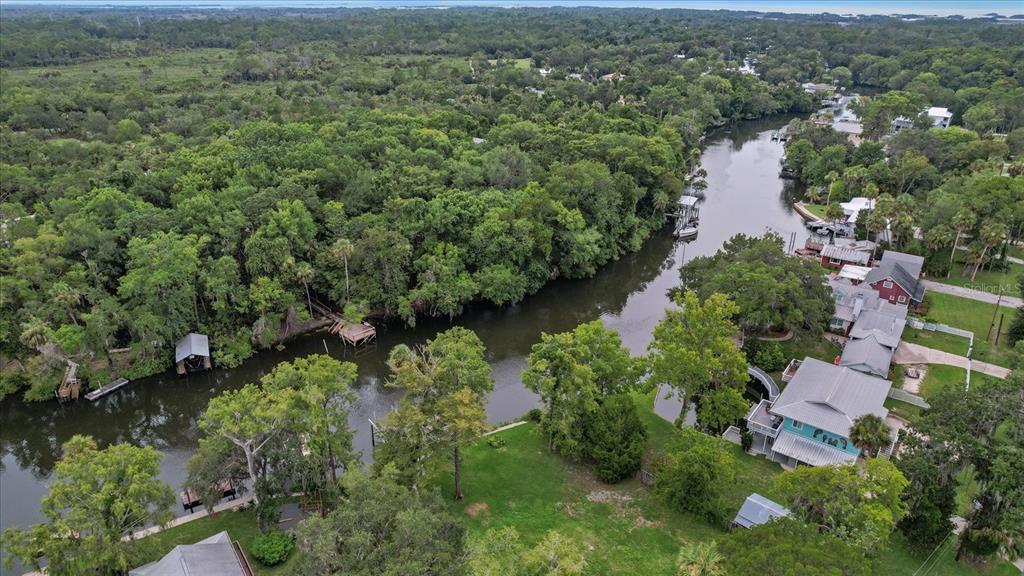 5328 Riverside Drive Yankeetown, FL 34498 - Photo 33 of 46 an aerial view of residential house with outdoor space and trees all around