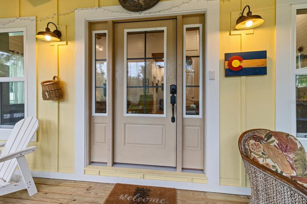 5328 Riverside Drive Yankeetown, FL 34498 - Photo 4 of 46 a front view of a house with a door