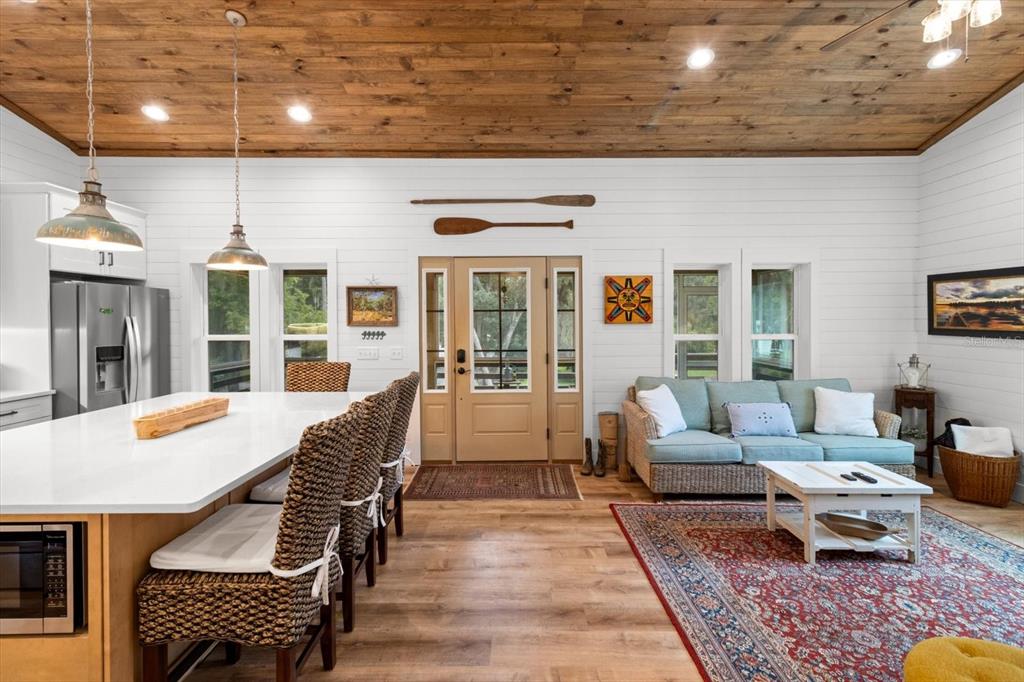 5328 Riverside Drive Yankeetown, FL 34498 - Photo 5 of 46 a living room with furniture and wooden floor