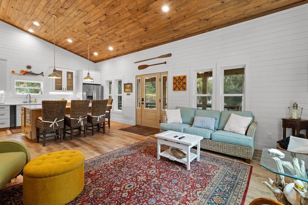 5328 Riverside Drive Yankeetown, FL 34498 - Photo 10 of 46 a living room with furniture and wooden floor