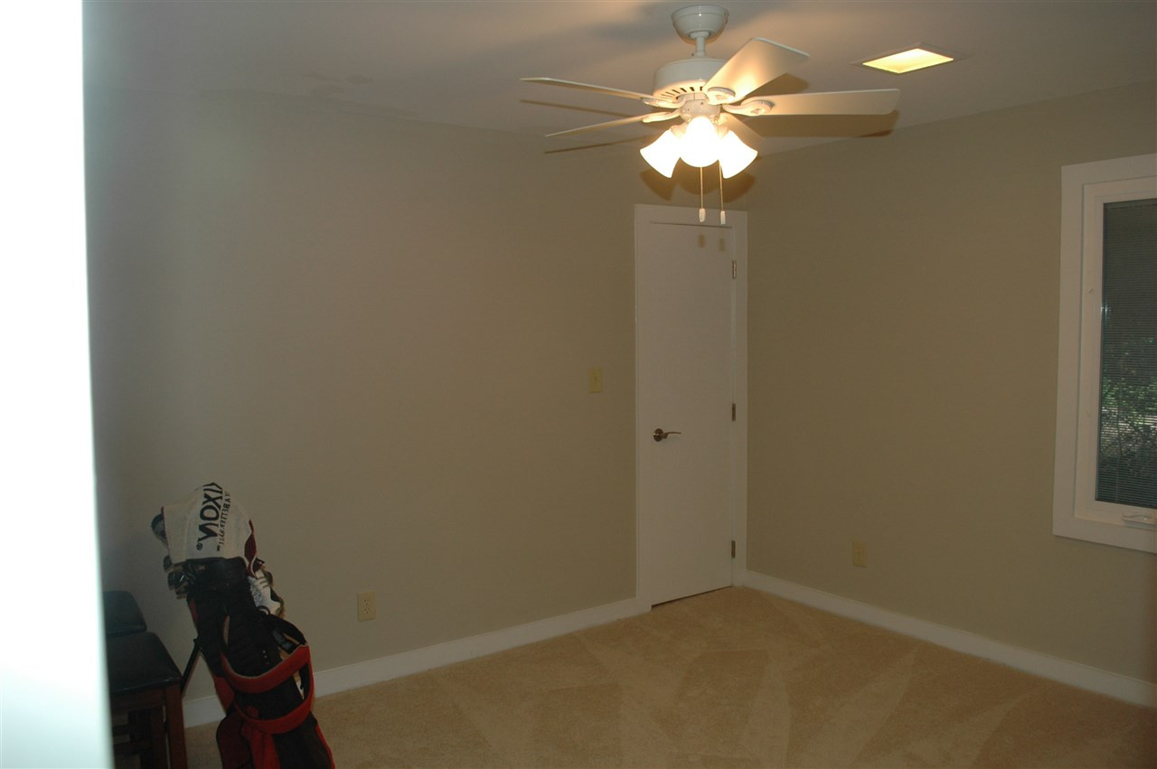2012 Countrywood Road North Raleigh, NC 27615 - Photo 11 of 18 3rd Bedroom with new carpet, ceiling fan and walk-in closet. Jack and Jill bathroom between bedroom #3 and #4. Bedroom