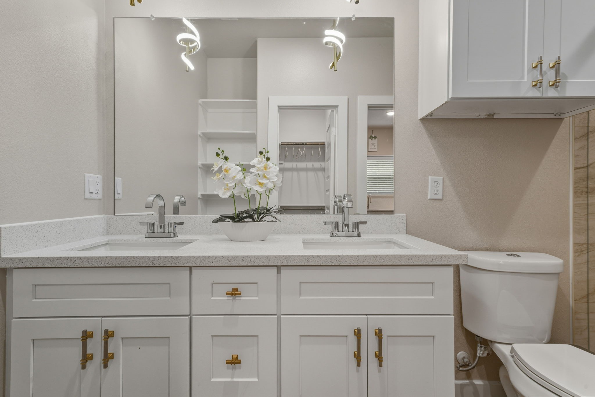 3539 Mt Pleasant Street, Unit B Houston, TX 77021 - Photo 13 of 16 a bathroom with a granite countertop toilet sink and mirror